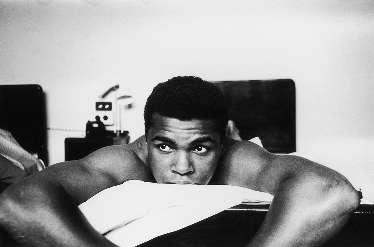 27th May 1963: American Heavyweight boxer, Cassius Clay (later Muhammad Ali), relaxing on his hotel bed in London. (Photo by Len Trievnor/Express/Getty Images)