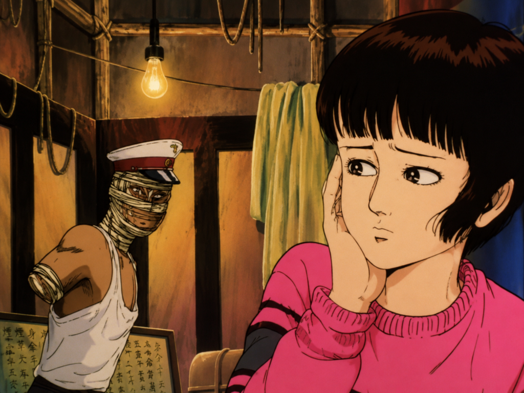 Midori dentro del espectáculo ambulante de la película de Hiroshi Harada