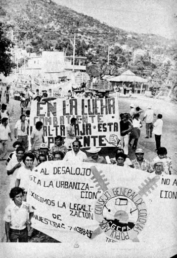 Marcha del Movimiento Urbano Popular con mantas contra los desalojos y por la urbanización y legalización de tierras.